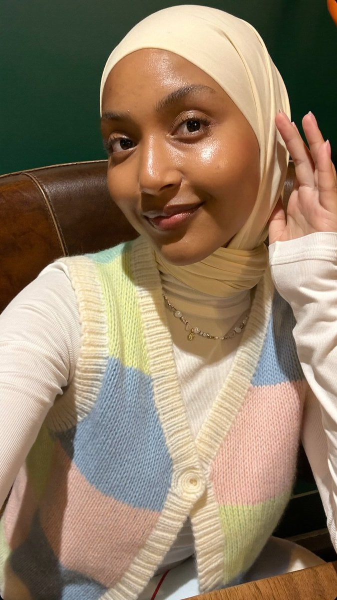 Woman Taking Selfie in Hijab