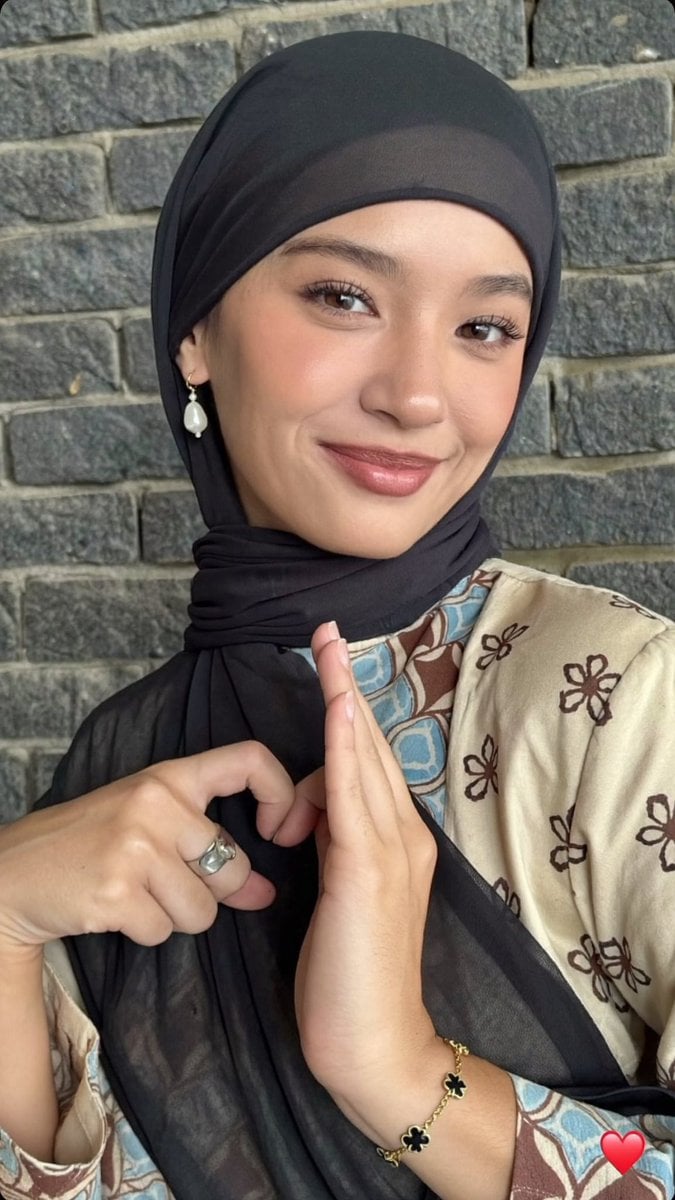 Portrait of Smiling Young Woman