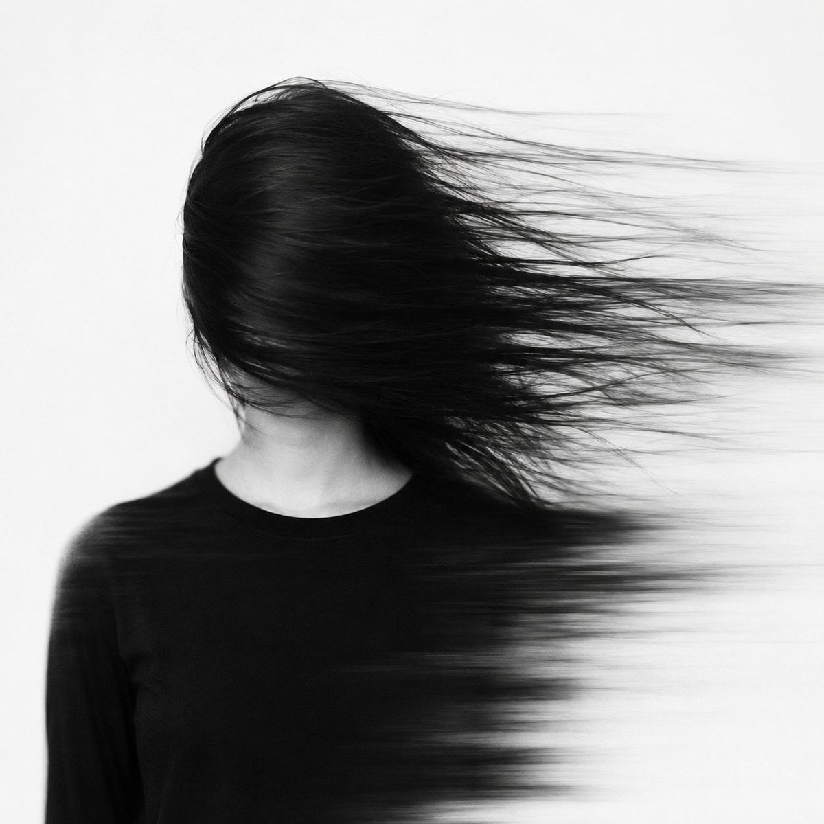 Surreal Monochrome Portrait with Sweeping Hair