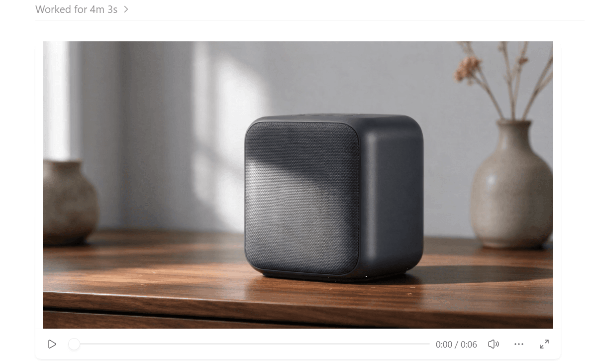 ChatGPT desktop chat where the Atlas Cloud plugin returns a six-second Seedance 2.5 video of a charcoal wireless speaker on a walnut desk
