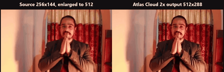 Side by side loop of a man talking to the camera, the 256 by 144 source enlarged to 512 pixels on the left and the 512 by 288 Atlas Cloud free AI video upscaler output on the right, the glasses, beard and curtain pattern holding a cleaner line on the right