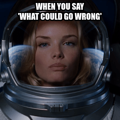 Meme GIF made in ChatGPT with the two-line caption When you say what could go wrong above a woman in a space helmet whose pink gum bubble bursts onto her visor