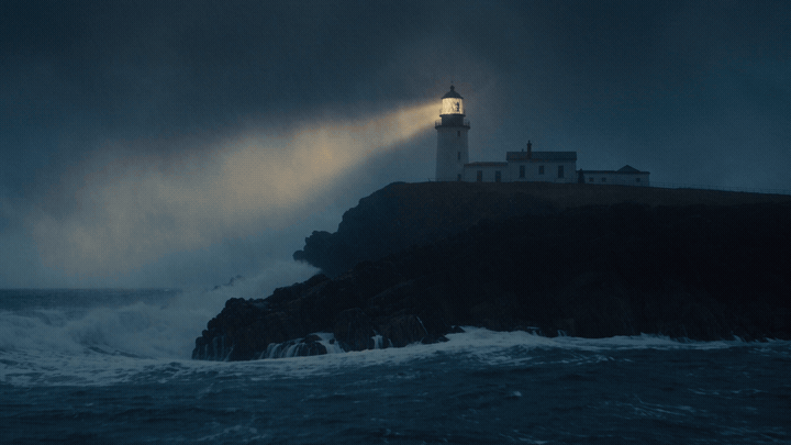 Eight-second Seedance 2.5 text-to-video clip made through Claude: a cliffside lighthouse at dusk, storm waves breaking over the rocks and the lamp glowing through the rain