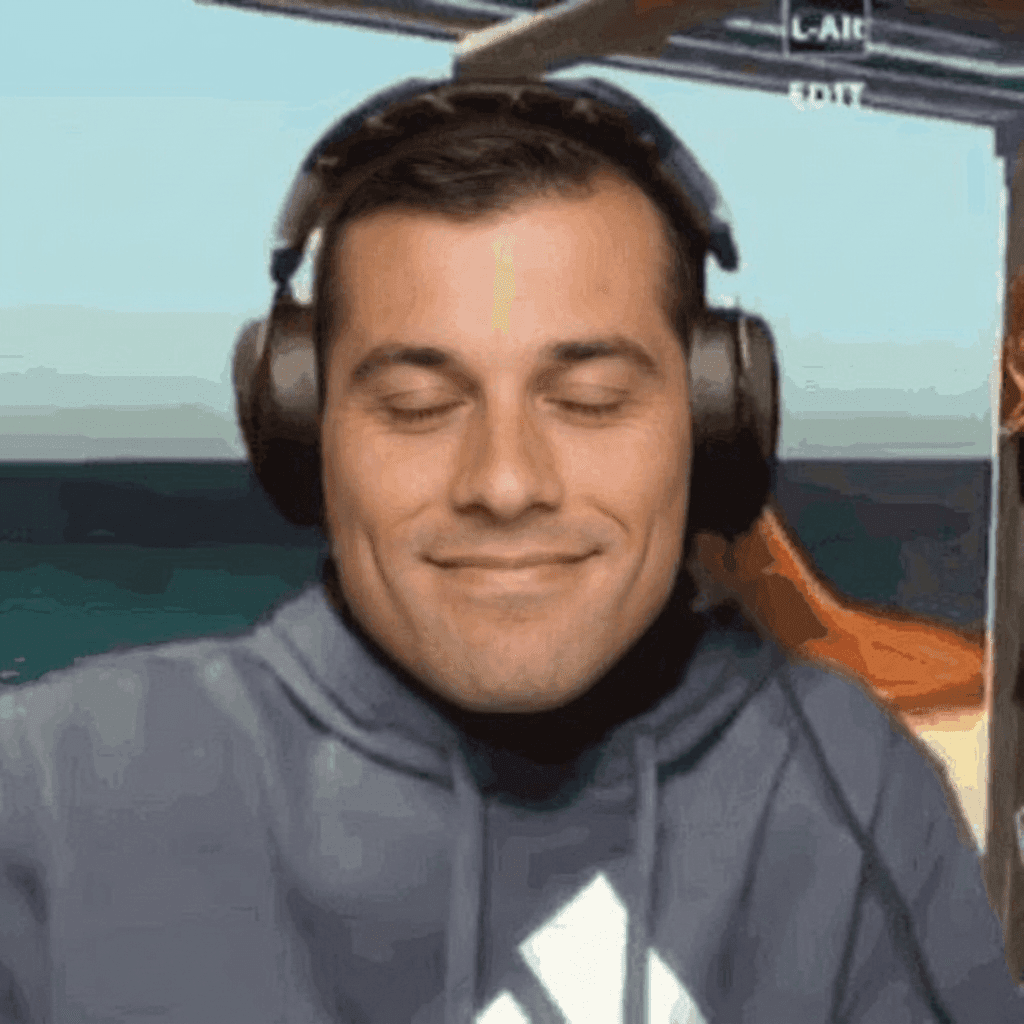 Smiling man with closed eyes wearing headphones