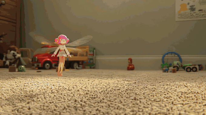 Tiny fairy with pink hair and wings hovers over carpet