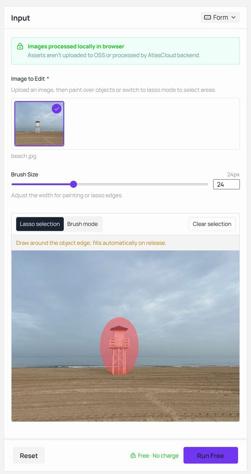 The free Object Eraser workspace with a lifeguard tower lassoed in red, showing the notice that images are processed locally in the browser, the Brush Size field, the Lasso selection and Brush mode toggles, and the Run Free button marked free of charge.
